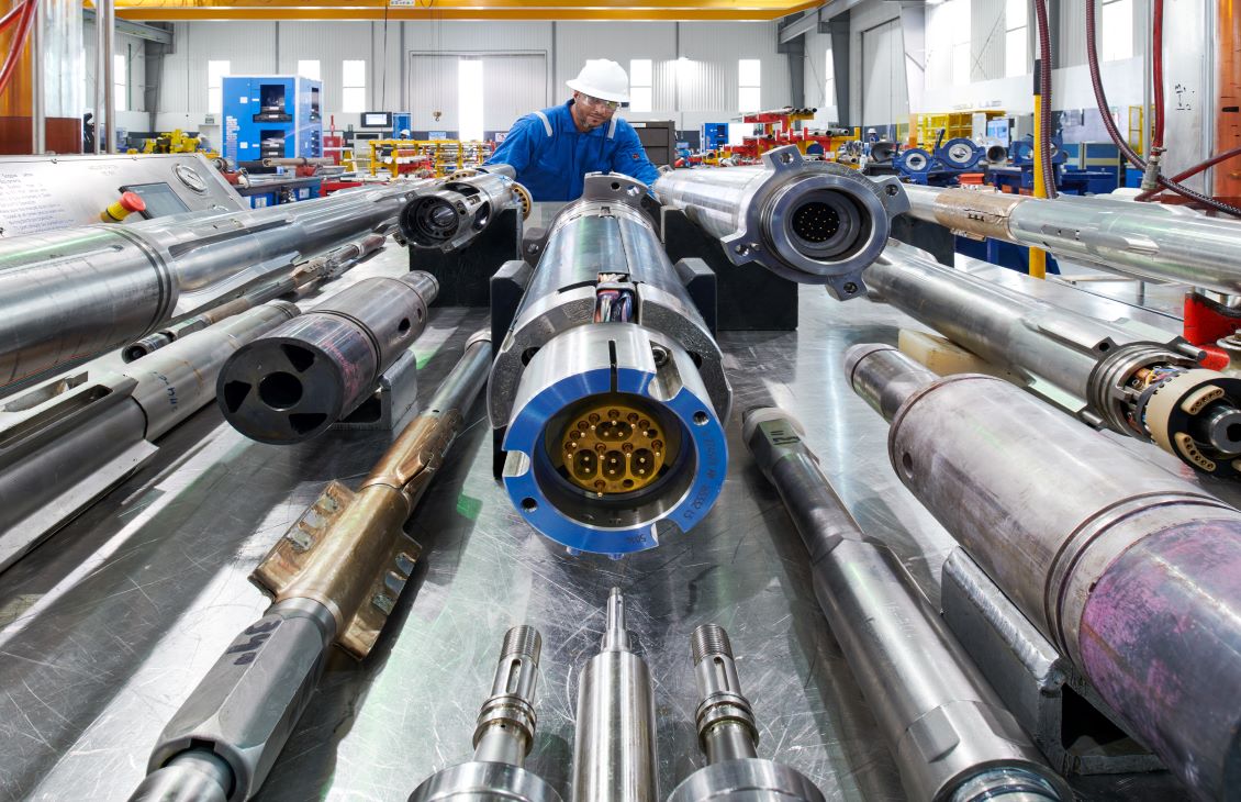 SLB employee bending over