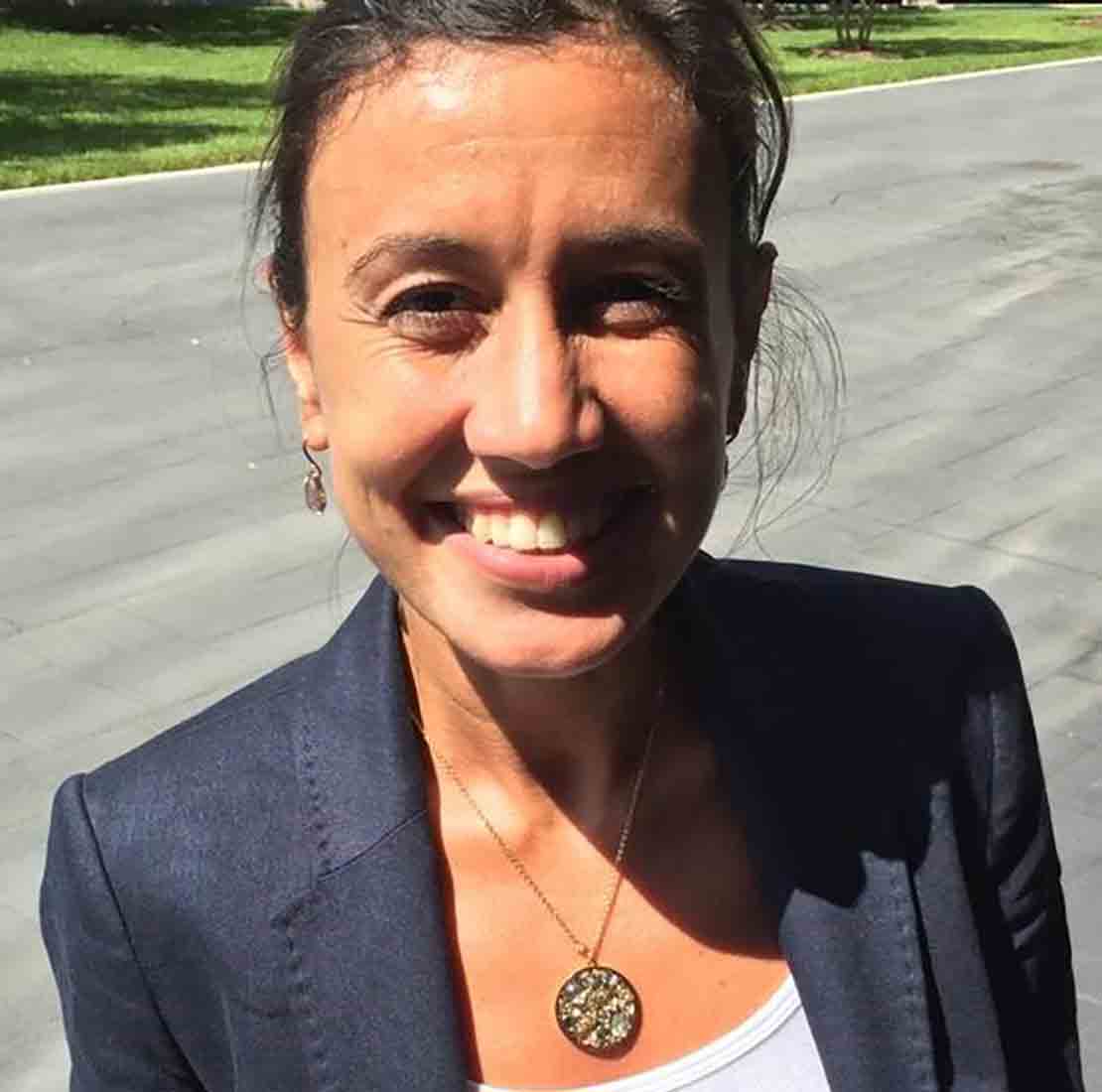 Headshot of Kahina, Marketing Director for the Digital and Integration division