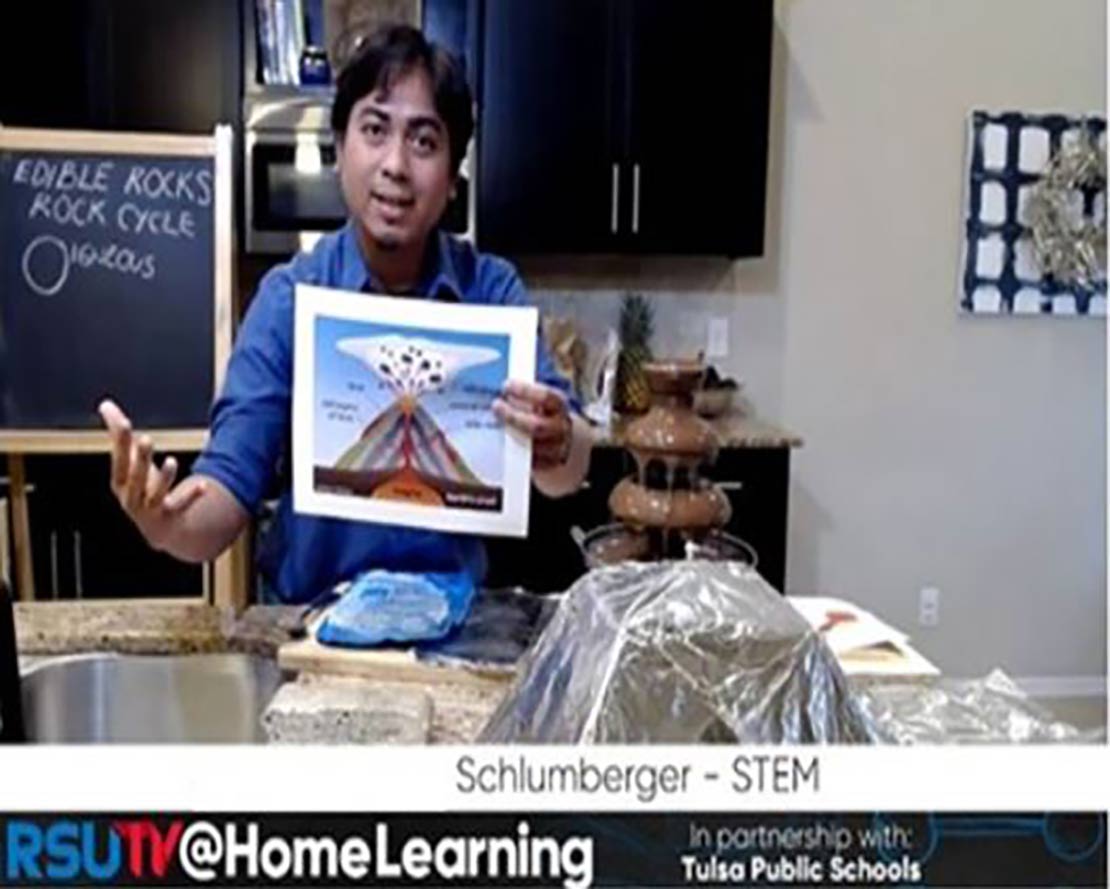 A Schlumberger instructor presents an educational lesson live on air.