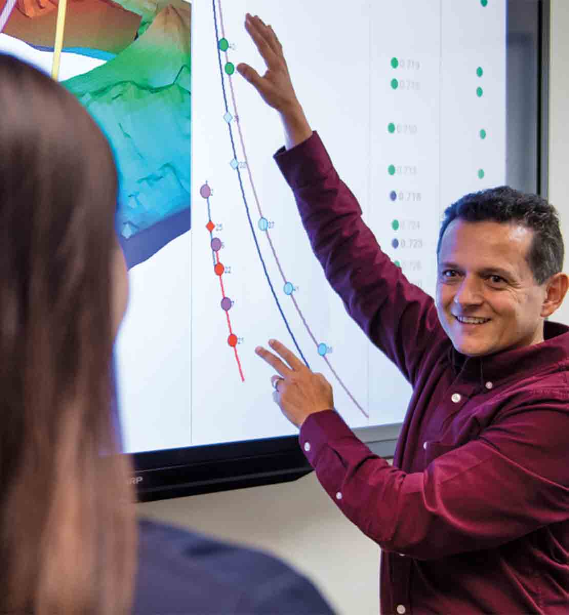 Image showing workers looking at data.