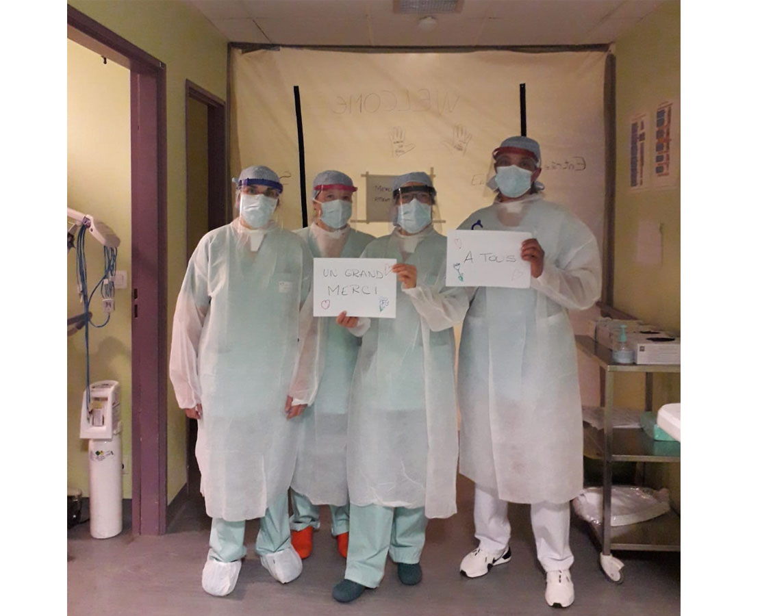 Healthcare staff at a hospital in France wearing face shields created on 3D printers.