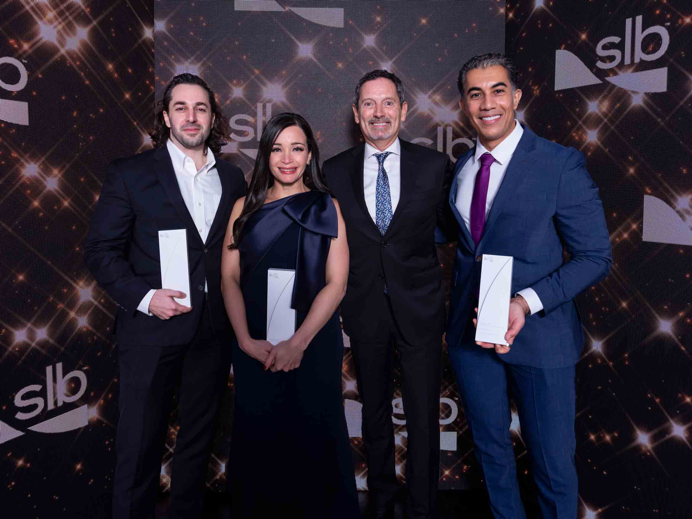 Gold Award Winner— To Net Zero- Ahead of the Curve (Pictured: Tarek Al Abbassi, Shenell Gopaul, Olivier Le Peuch, Mohamed Helal)